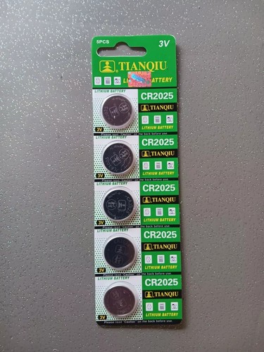 Plaque piles bouton - de,